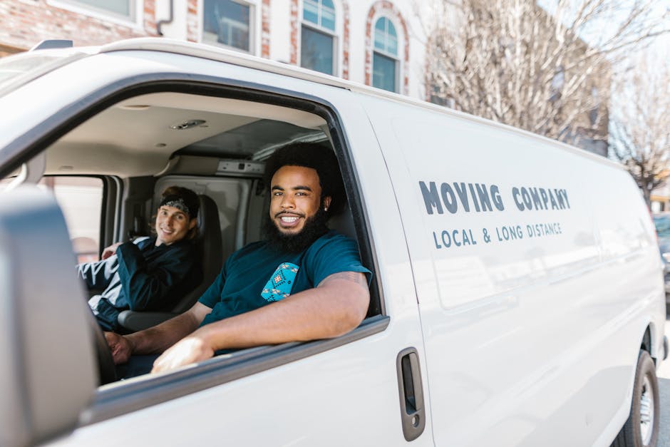 Long distance movers loading a moving truck
